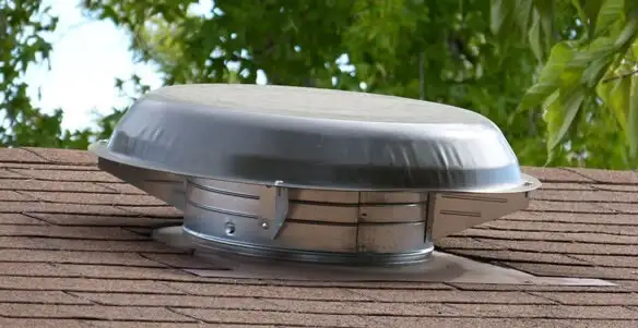 attic fan installation services with low-profile roof ventilation unit in Birmingham, AL