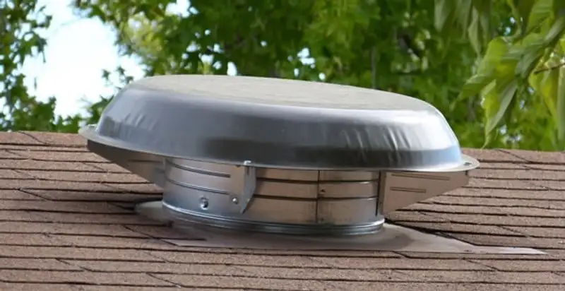 attic fan installation services with low-profile roof ventilation unit in Birmingham, AL