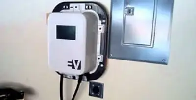 Electric car charger installation with wall-mounted EV charging station in Birmingham, AL
