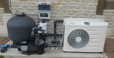 electric heater installation services with connected outdoor heating system equipment in Birmingham, AL