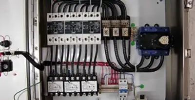 Electrical panel installation with organized circuit breakers and wiring in Birmingham, AL