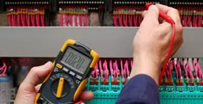 electrical service showing professional testing and troubleshooting of electrical panel by licensed electricians in Birmingham, AL