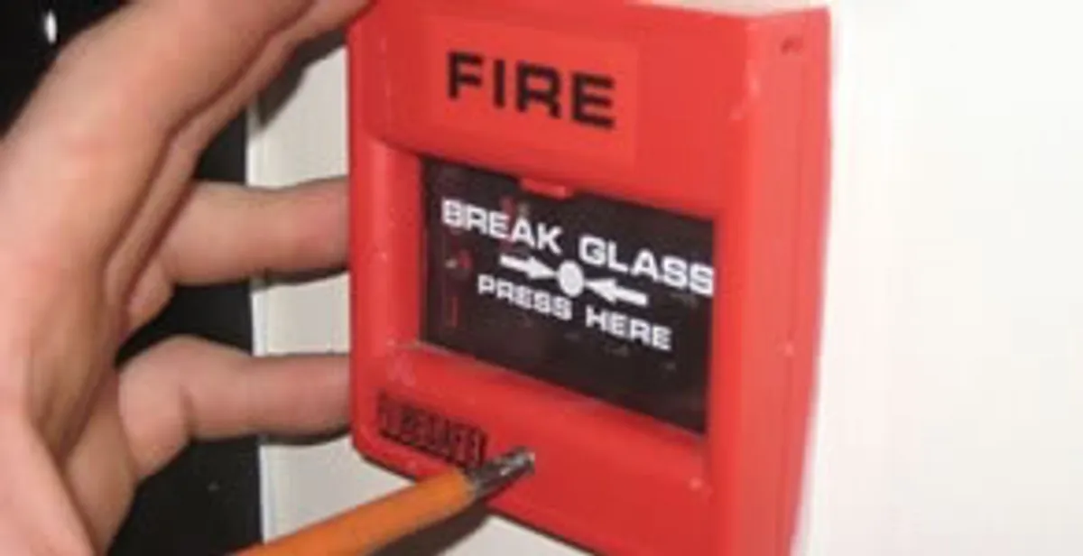 fire alarm installation service showing manual fire alarm pull station installed by licensed electricians in Birmingham, AL