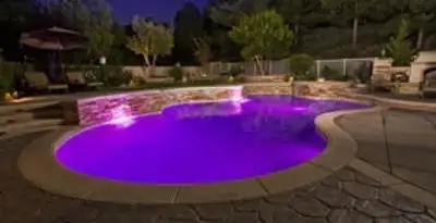 pool light installation and repair services illuminating a residential swimming pool in Birmingham, AL