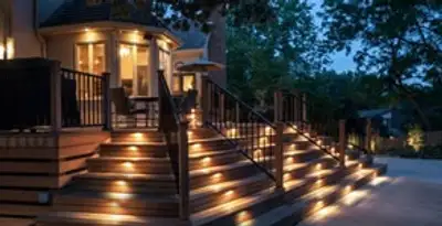 Residential electrician installing outdoor lighting for home safety in Birmingham, AL