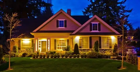 security light installation services illuminating a residential exterior at night in Birmingham, AL