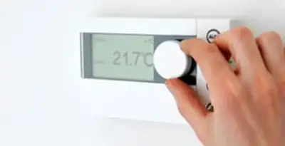 Thermostat installation service with professional adjusting temperature control in Birmingham, AL