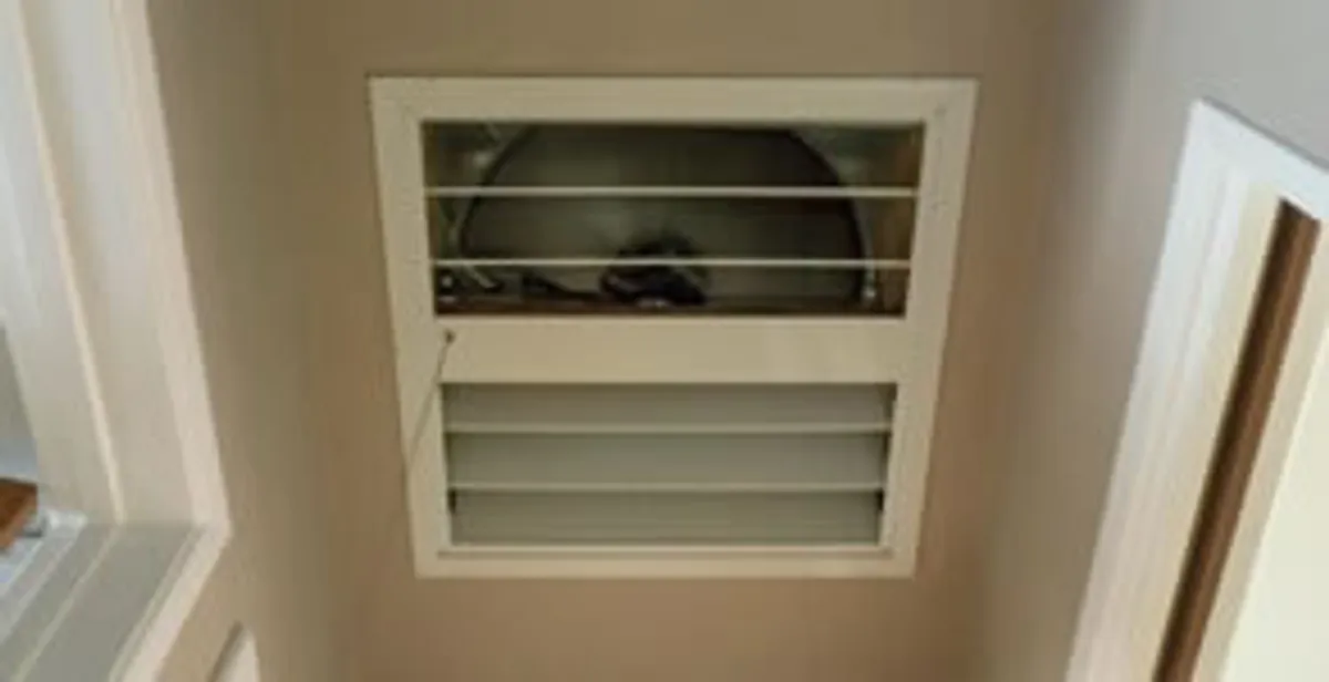 whole house fan installation services with ceiling-mounted ventilation system in Birmingham, AL